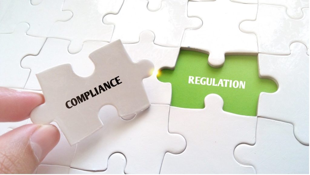 Cargo ship navigating EU ETS compliance.